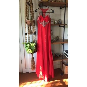 Full length formal gown with beaded detail.